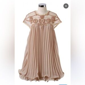 Elegant soft nude colored pleated dolly DRESS with various details. One size.